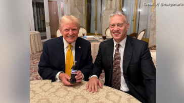 Donald Trump and James Quincey